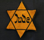 Estrela de Davi, um símbolo judeu, utilizado pelos nazistas para identificar os judeus alemães.